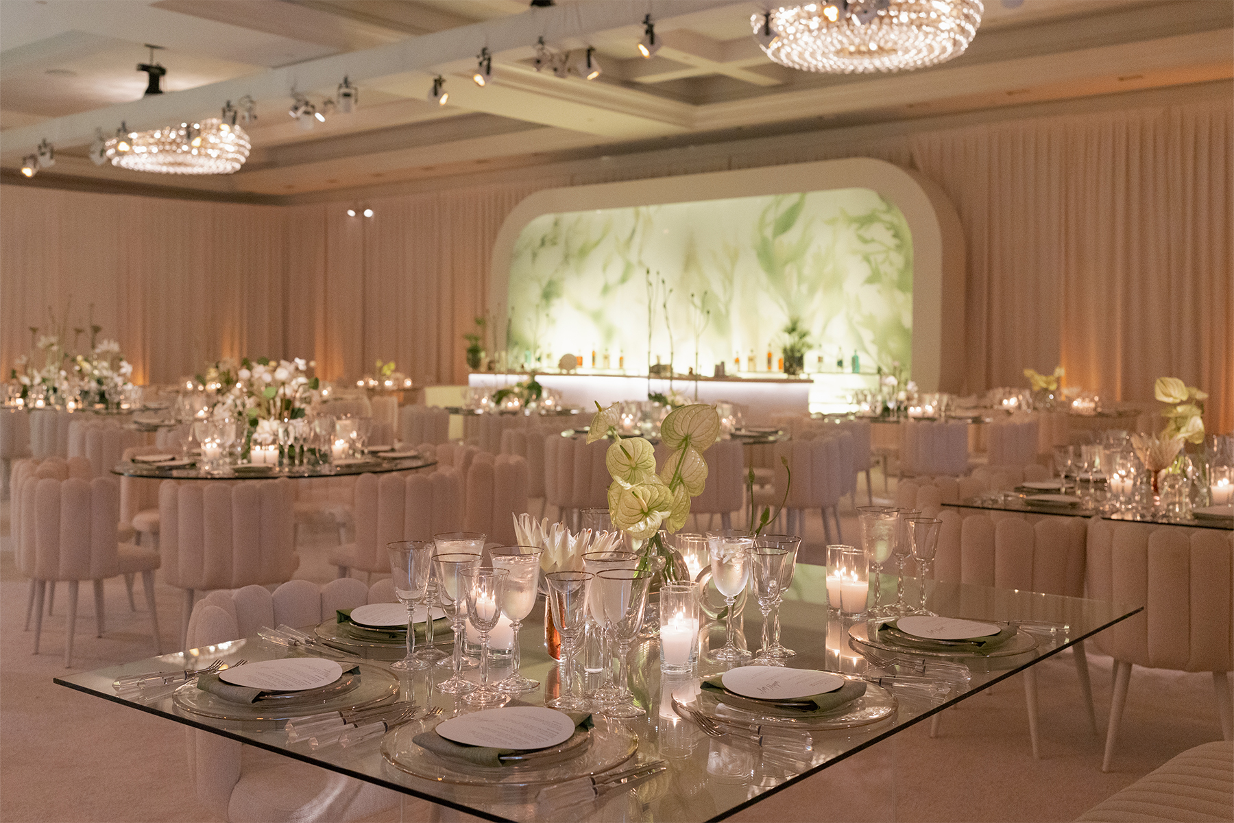 Event bar surrounded by mirrored disco balls and warm lighting